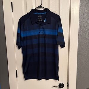 Men’s size Large Oakley brand polo in deep navy blue with various blue stripes